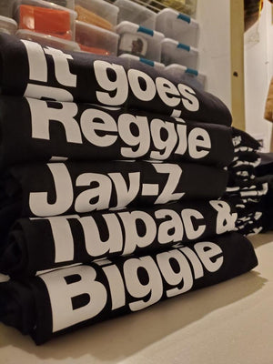 
                  
                    It Goes Reggie T Shirt - Paisley
                  
                