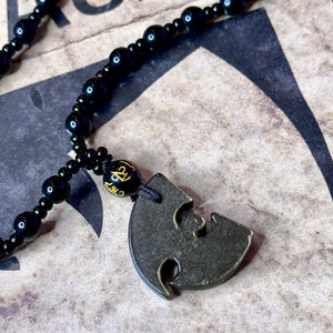 
                  
                    Golden Sheen Obsidian Wu Tang Necklace
                  
                